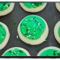 Sugar Cookies with Green Frosting and Sprinkles