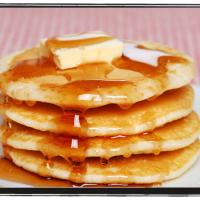 Stack of Pancakes with butter and syrup