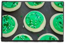 Sugar Cookies with Green Frosting and Sprinkles