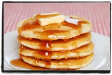 Stack of Pancakes with butter and syrup